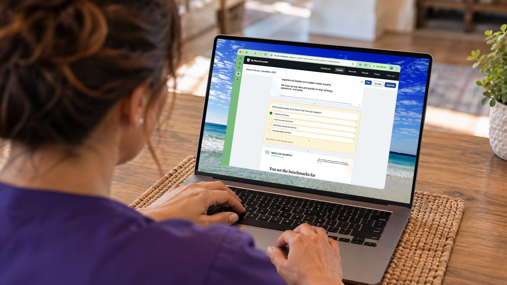 A person building a training quiz on a laptop.